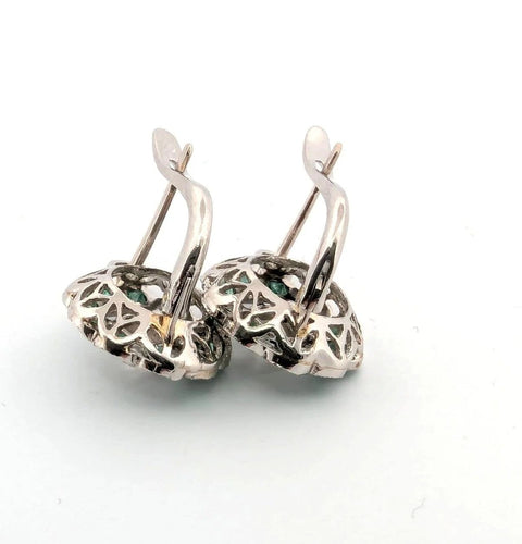Boucles d'oreilles Boucles d’oreilles en platine avec émeraudes et diamants 58 Facettes 103/C 2026