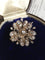 Broche Broche fleur ancienne en or rose 18K, argent et diamants 58 Facettes 256