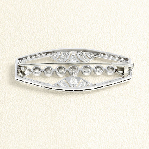 Broche Broche plaque Platine et Diamants 58 Facettes 65000016