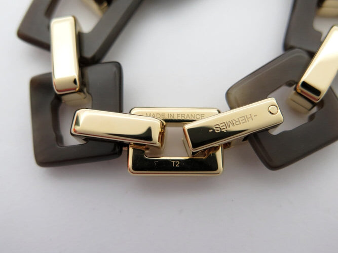 Bracelet Hermès Écuyère - Bracelet en corne de buffle et métal doré 58 Facettes 274427