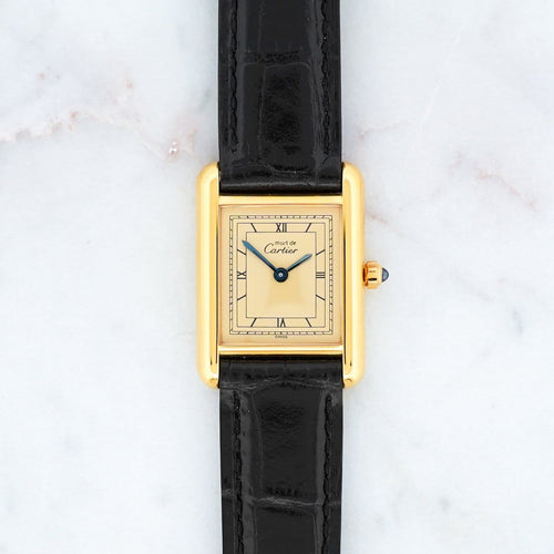 Montre Cartier Tank Must - Montre SM à cadran champagne chemin de fer en vermeil 58 Facettes 511