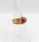 Bague rétro en or 18k avec rubis synthétique et diamants 58 Facettes A01910