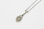 Collier Collier - Pendentif poire en or jaune et blanc avec perles et diamants 58 Facettes 10736