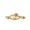 Broche Broche Art nouveau en or jaune 750 avec rubis et perle 58 Facettes 434771