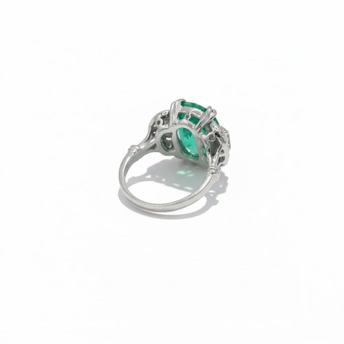 Bague 50 Bague en or blanc 18 carats à émeraude de Colombie 5,12 ct et diamants 58 Facettes 1.0001333/3