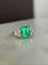 Bague 54 Bague en or jaune 18K avec émeraude colombienne et diamants 58 Facettes 259