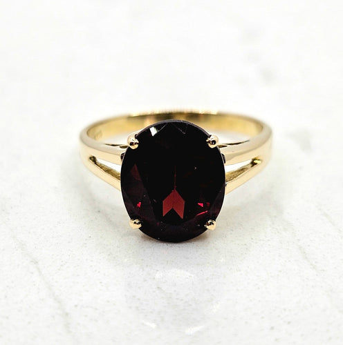 Bague 55 Bague solitaire en or jaune 14 carats et grenat ovale 58 Facettes 725