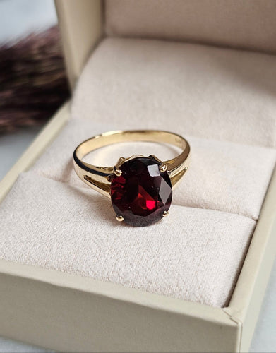 Bague 55 Bague solitaire en or jaune 14 carats et grenat ovale 58 Facettes 725