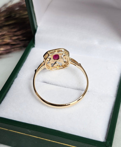 Bague 60 Bague vintage Art déco en or jaune et blanc 18 ct rubis et diamants 58 Facettes 720