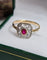 Bague 60 Bague vintage Art déco en or jaune et blanc 18 ct rubis et diamants 58 Facettes 720