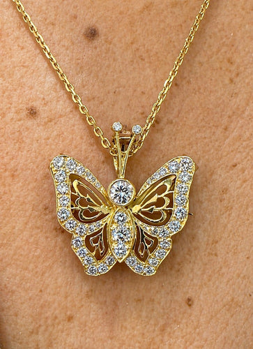 Collier Collier pendentif papillon en or jaune 18 carats et diamants 58 Facettes Pap