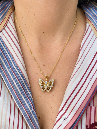 Collier Collier pendentif papillon en or jaune 18 carats et diamants 58 Facettes Pap