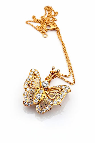 Collier Collier pendentif papillon en or jaune 18 carats et diamants 58 Facettes Pap