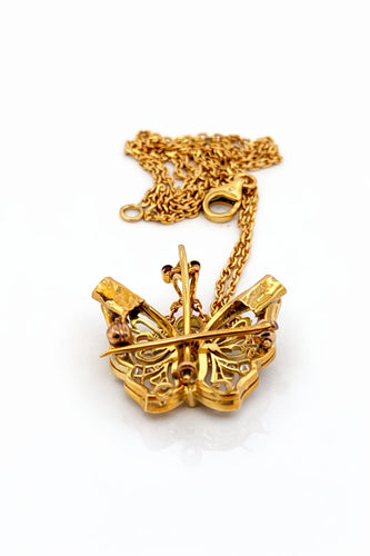 Collier Collier pendentif papillon en or jaune 18 carats et diamants 58 Facettes Pap