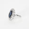 Bague 50 Elegante Bague marguerite en platine et or gris, saphir de synthèse et diamants 58 Facettes 260264