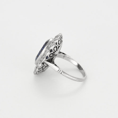 Bague 50 Elegante Bague marguerite en platine et or gris, saphir de synthèse et diamants 58 Facettes 260264