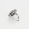 Bague 50 Elegante Bague marguerite en platine et or gris, saphir de synthèse et diamants 58 Facettes 260264