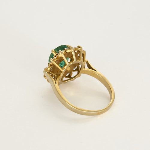 Bague 57 Bague marguerite en or jaune, émeraude 2.45 carats environ et diamants 58 Facettes 260209
