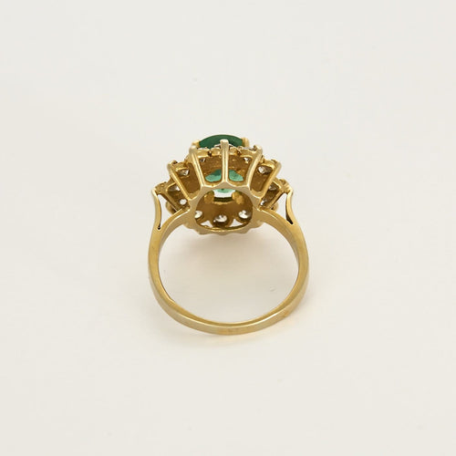 Bague 57 Bague marguerite en or jaune, émeraude 2.45 carats environ et diamants 58 Facettes 260209