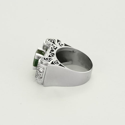 Bague 51 Bague géométrique en or gris, tourmaline verte et diamants. 58 Facettes B250128