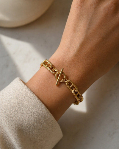 Bracelet Bracelet chaîne en or jaune 18 carats avec fermoir toggle 58 Facettes Cor