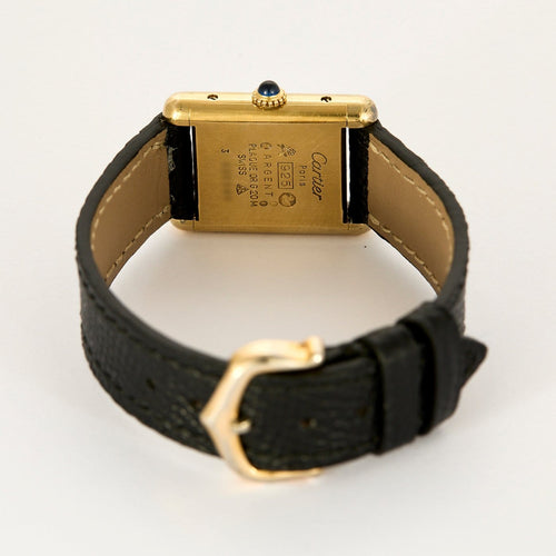 Montre Cartier Tank Must - Montre en argent plaqué or, cadran crème 58 Facettes A1179