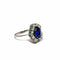 Bague Bague halo en or blanc 18k avec tourmaline bleue et diamants 58 Facettes 50451