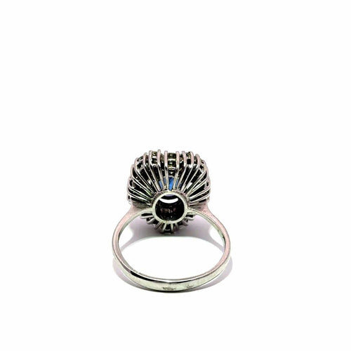 Bague Bague halo en or blanc 18k avec tourmaline bleue et diamants 58 Facettes 50451