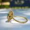 Bague 57 GemParis - Bague marguerite en or jaune 18k, émeraude de Zambie et diamants 58 Facettes 250