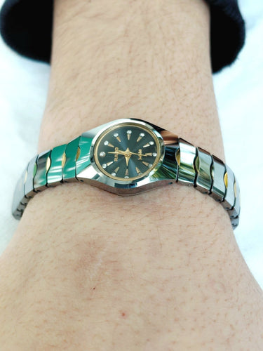 Montre Rado Jubilé - Montre à quartz femme en acier et tungstène avec diamants 58 Facettes ID 1750586