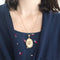 Pendentif Pendentif médaillon porte-souvenir XIXe siècle en or 18k et perle 58 Facettes 254