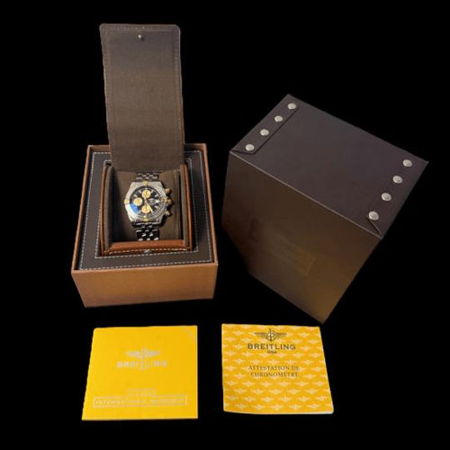 Montre Breitling Chronomat - Montre chronographe en or jaune et acier 58 Facettes MT46208