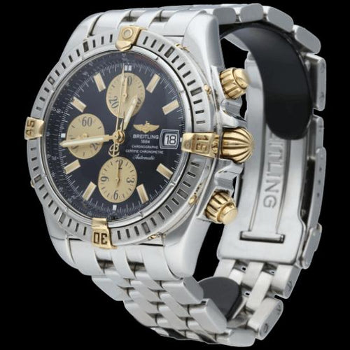 Montre Breitling Chronomat - Montre chronographe en or jaune et acier 58 Facettes MT46208