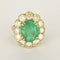 Bague 43 Elegante Bague Marguerite en or jaune, émeraude 3.80 carats environ et diamants 58 Facettes 260210