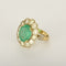 Bague 43 Elegante Bague Marguerite en or jaune, émeraude 3.80 carats environ et diamants 58 Facettes 260210