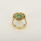 Bague 43 Elegante Bague Marguerite en or jaune, émeraude 3.80 carats environ et diamants 58 Facettes 260210