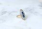 Bague 51 Bague marquise en or jaune 18 kt et platine, saphirs de Ceylan et diamants 58 Facettes