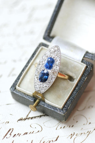 Bague 51 Bague marquise en or jaune 18 kt et platine, saphirs de Ceylan et diamants 58 Facettes