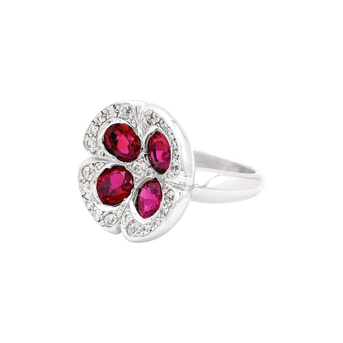 Bague 54 Bague "Fleur", or blanc, rubis synthétiques et diamants. 58 Facettes 35614