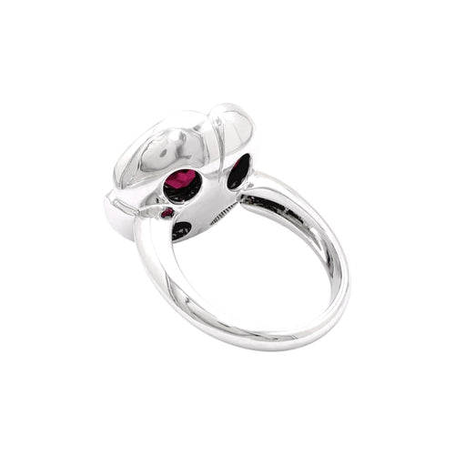 Bague 54 Bague "Fleur", or blanc, rubis synthétiques et diamants. 58 Facettes 35614
