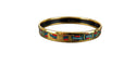 Hermès - Bracelet jonc en plaqué or et émail motif rubans 58 Facettes