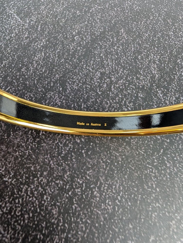 Hermès - Bracelet jonc en plaqué or et émail motif rubans 58 Facettes