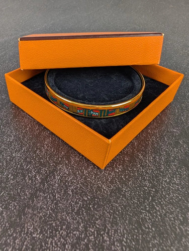 Hermès - Bracelet jonc en plaqué or et émail motif rubans 58 Facettes