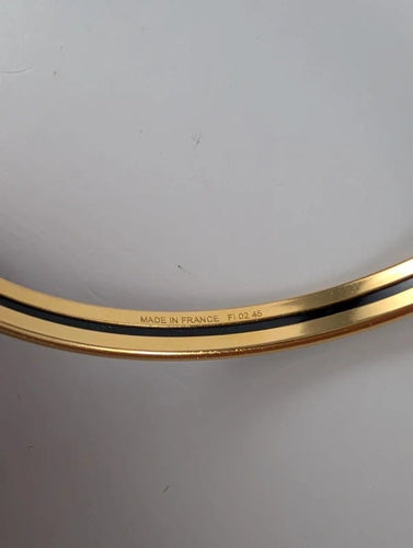 Bracelet Hermès - Jonc Uni en plaqué or et émail noir 58 Facettes 1125