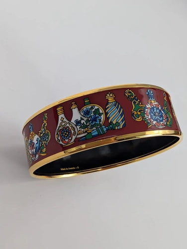 Bracelet Hermès - Jonc « Qu'importe le Flacon » en plaqué or et émail 58 Facettes 608