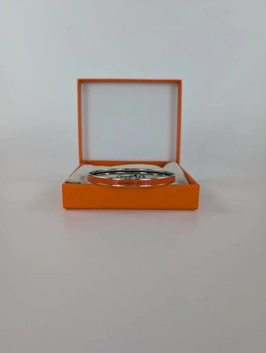 Bracelet Hermès - Bracelet jonc Uni en acier et émail orange 58 Facettes 1141
