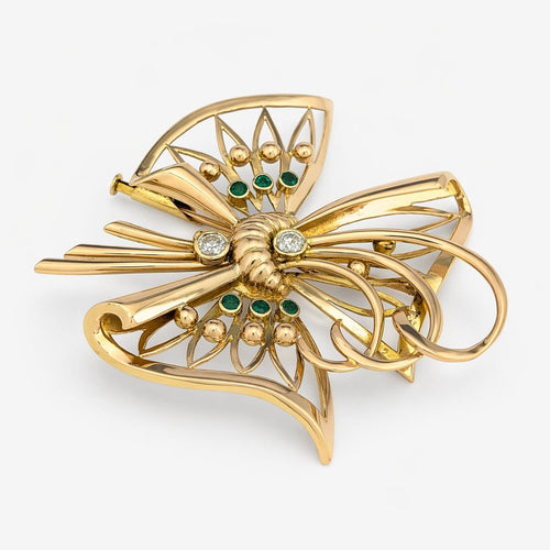 Broche Broche nœud en or jaune, diamants et émeraudes 58 Facettes 36314