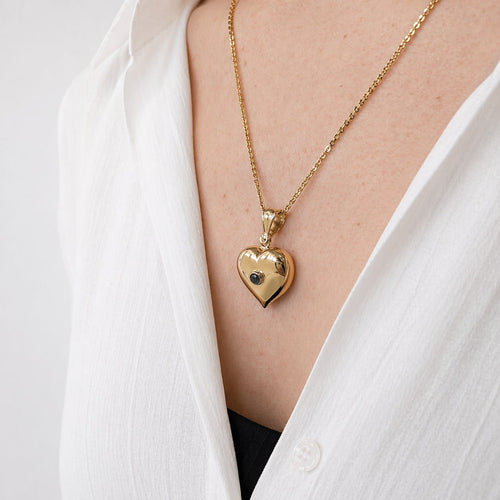 Pendentif Pendentif cœur en or jaune et pierre bleue 58 Facettes 36358