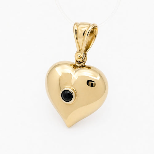 Pendentif Pendentif cœur en or jaune et pierre bleue 58 Facettes 36358