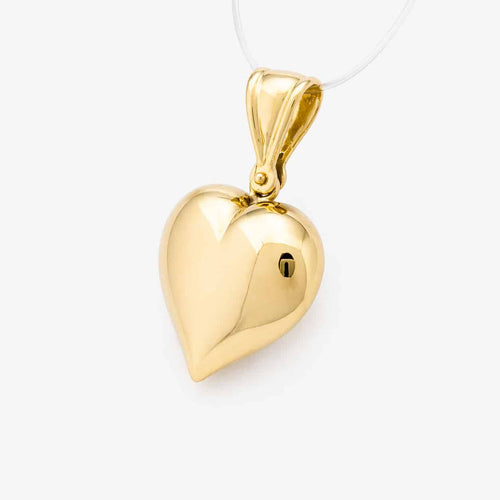 Pendentif Pendentif cœur en or jaune et pierre bleue 58 Facettes 36358